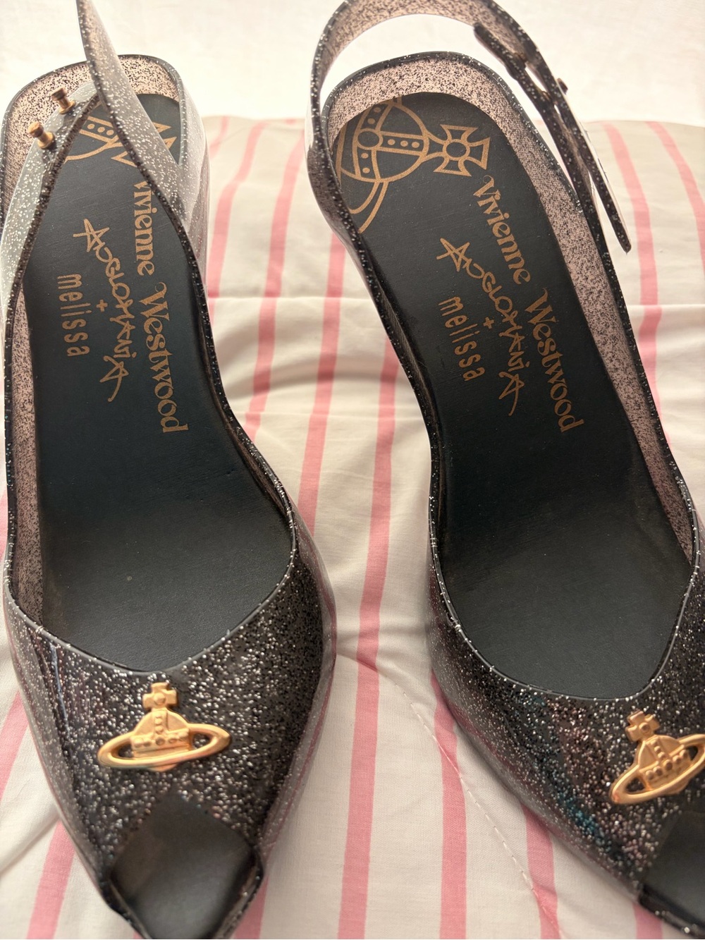 Vivienne Westwood Glitter Slingback Pumps in Black with gold orb.